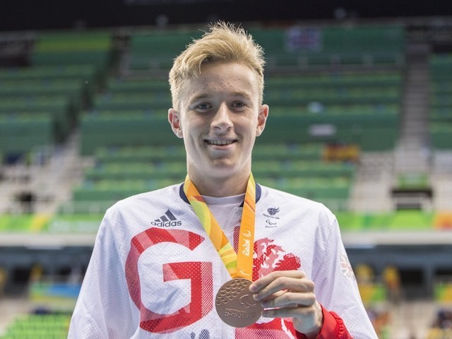 Lewis White with medal