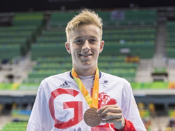 Lewis White with medal